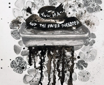 Dark drippy blob on a paper shredder against a flower background